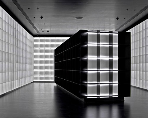 iksoi design studio creates monochromatic interior for liquor store in india