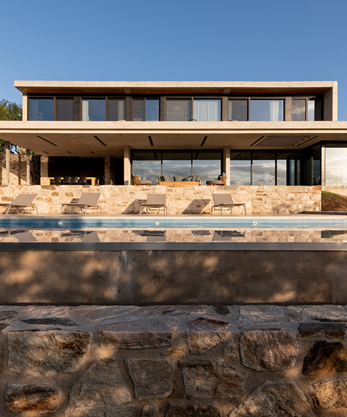 BP arquitectura sites the concrete Q2 house among the mountains of argentina