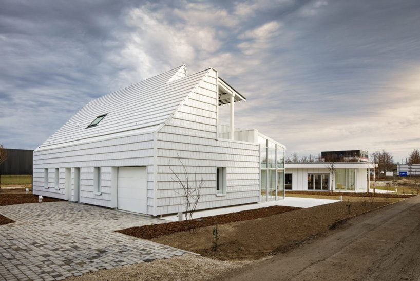 bruno rollet architecte completes two connected houses in northeastern france