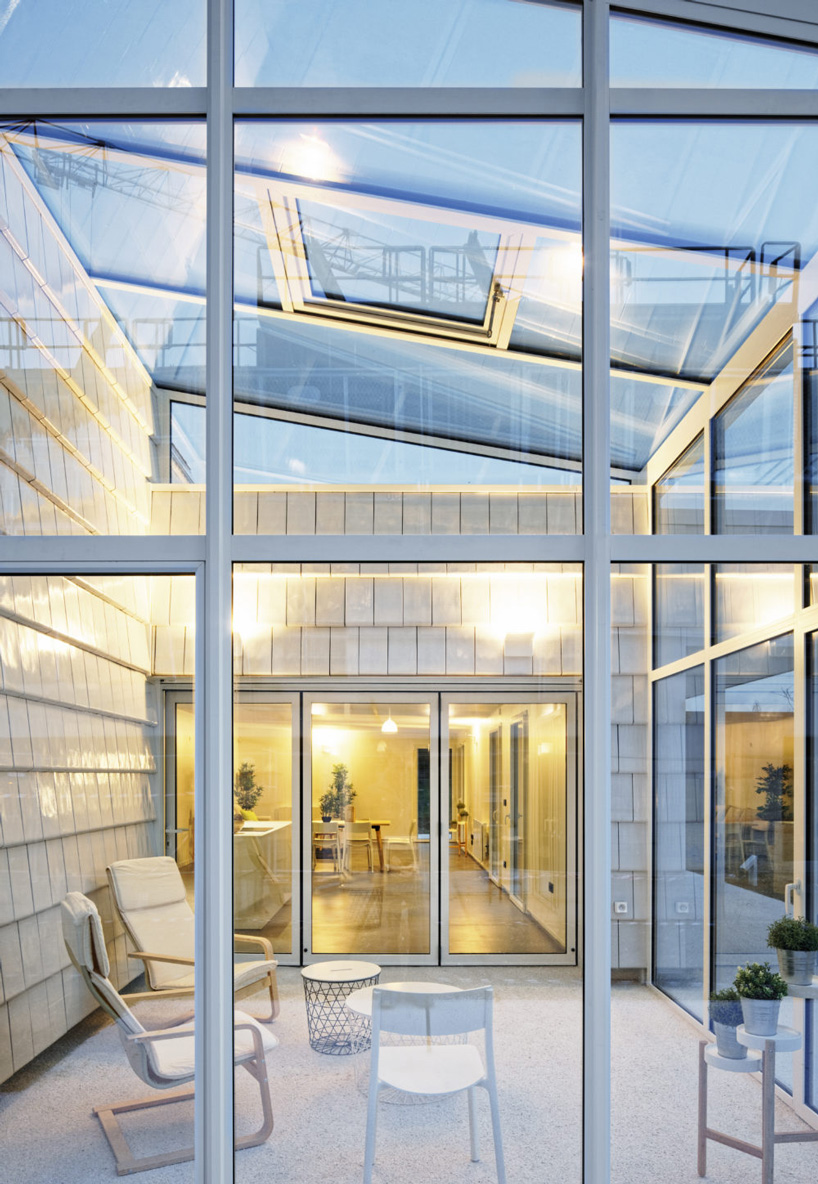 bruno rollet architecte completes two connected houses in northeastern france