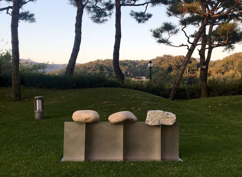 korean designer chiho cheon's bench design uses stone to harmonize with nature