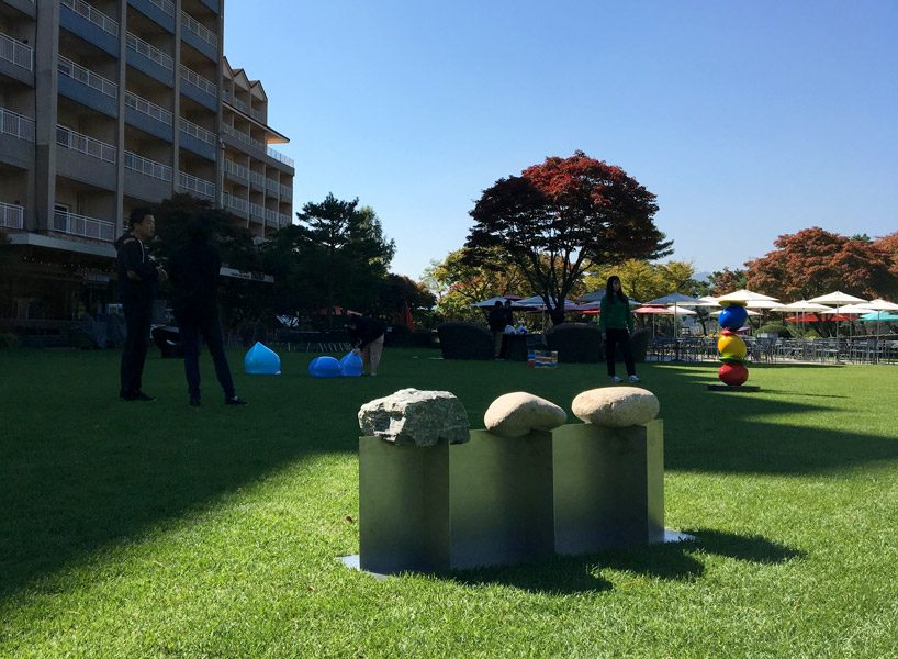 korean designer chiho cheon's bench design uses stone to harmonize with nature