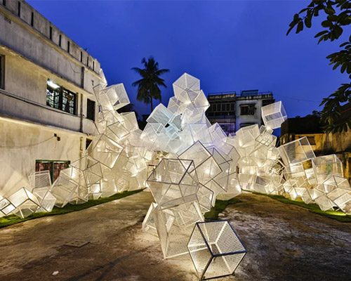 abin design studio forms the festive pavilion from tessellated boxes in india