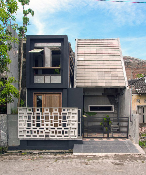 this house in indonesia turns doors into tables and windows