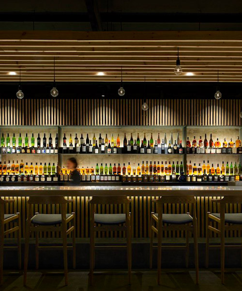 imafuku architects renovates beijing's old building into a japanese izakaya pub