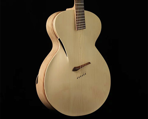 maxwell carefully crafts 'infinitum' to re-imagine traditional acoustic guitar design