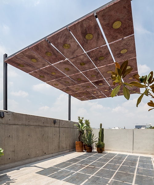 PALMA suspends gridded canopy of volcanic stone over mexico city terrace