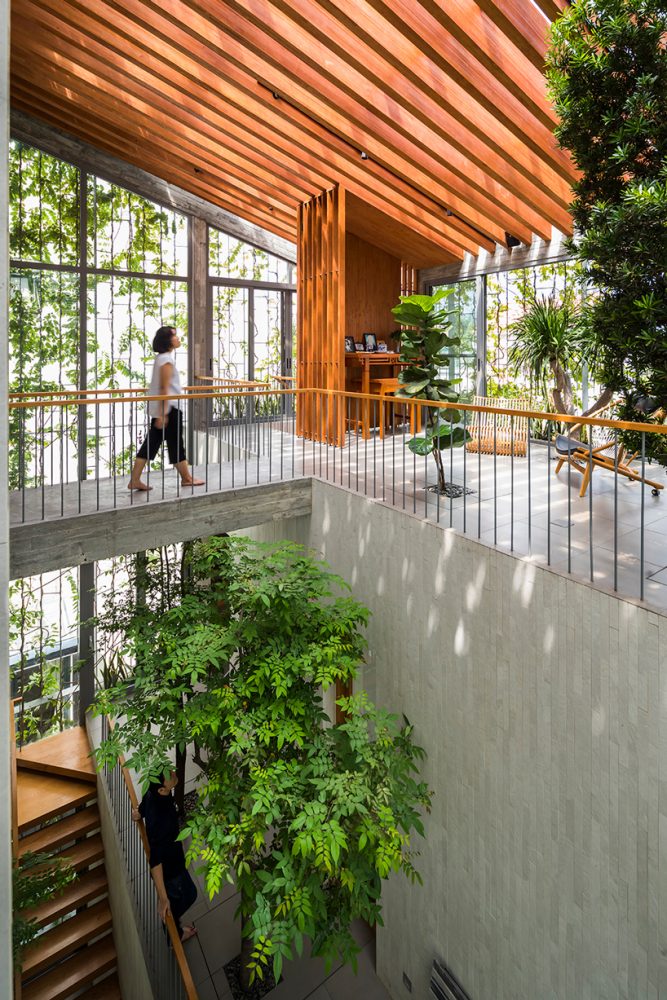 vo trong nghia extends park space into its forested residential interior
