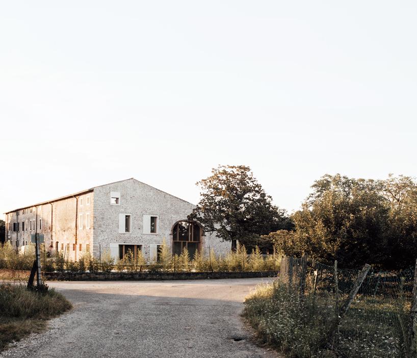 studio wok blends history and modernity with a country home in verona