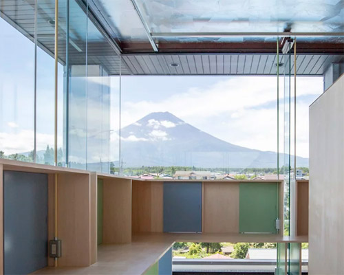 this coworking office in japan overlooks mount fuji and its surroundings