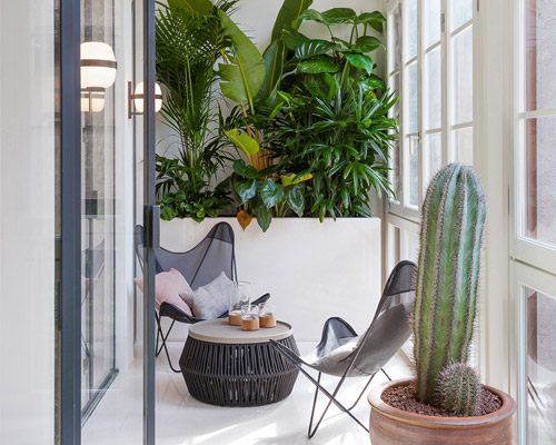 YLAB arquitectos creates sunny interior in barcelona apartment renovation