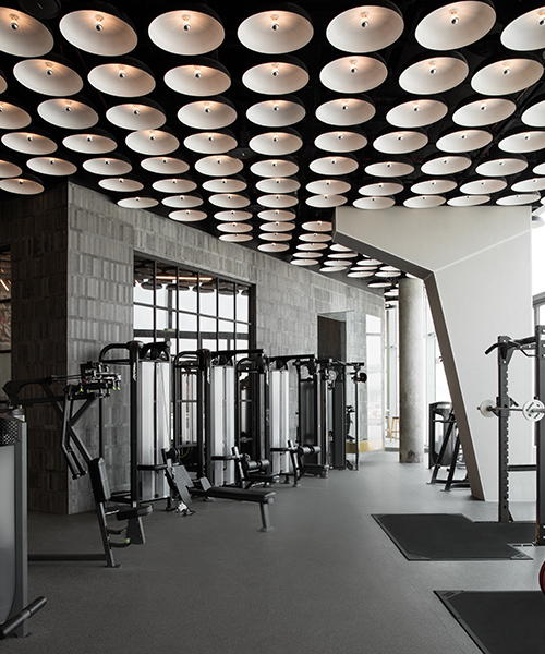 VSHD designs gym inspired by brutalism in architecture and underground fight clubs