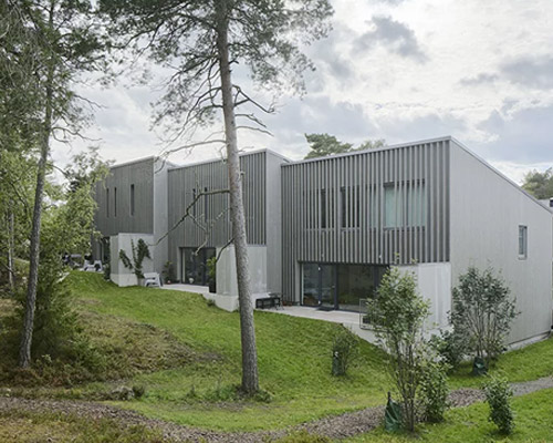 arklab staggers rows of houses to follow the contours of the land in stockholm