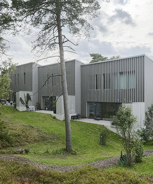 arklab staggers rows of houses to follow the contours of the land in stockholm