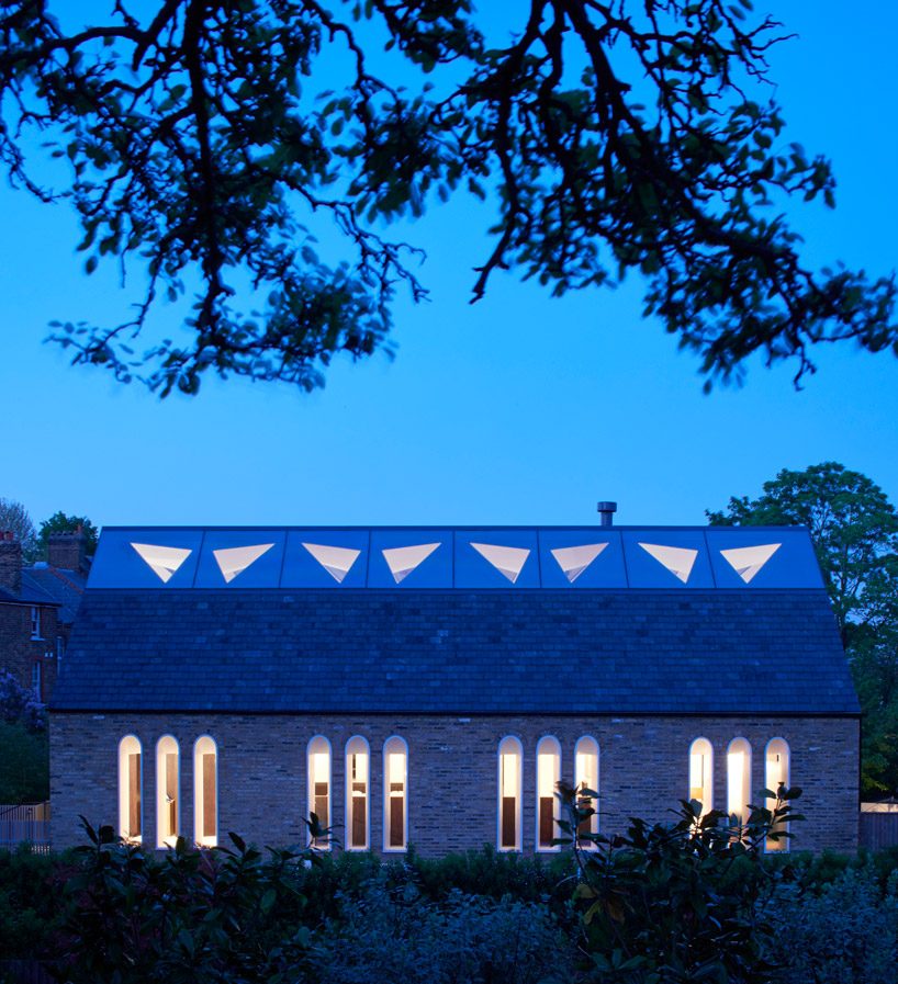 craftworks applies triangular skylights to convert london chapel into guest house