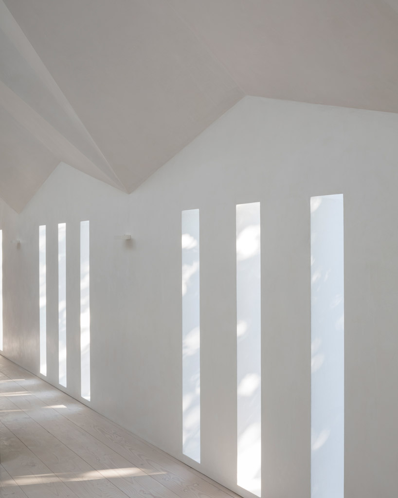 craftworks applies triangular skylights to convert london chapel into guest house