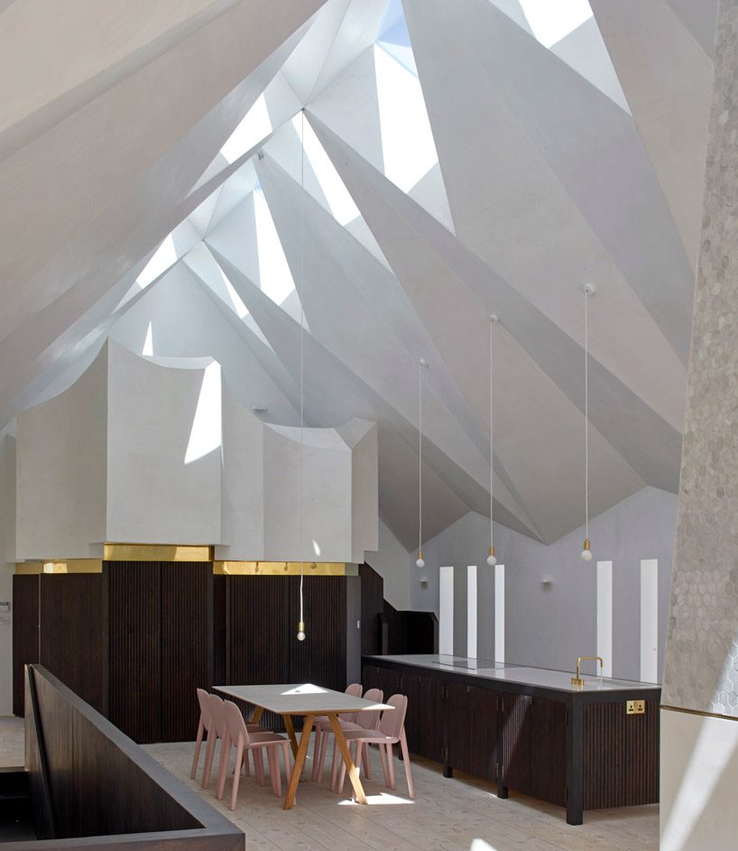 craftworks applies triangular skylights to convert london chapel into guest house