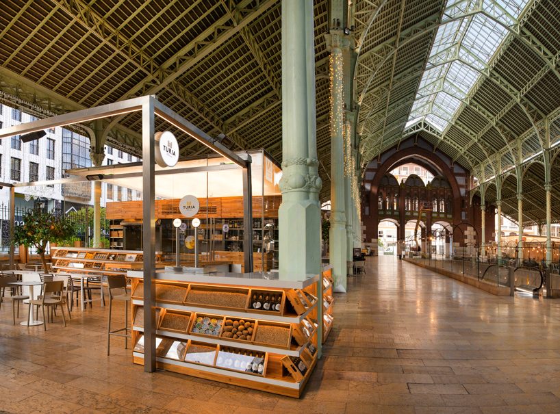 micub restaurant by culdesac references the traditional baskets of valencia's colón market