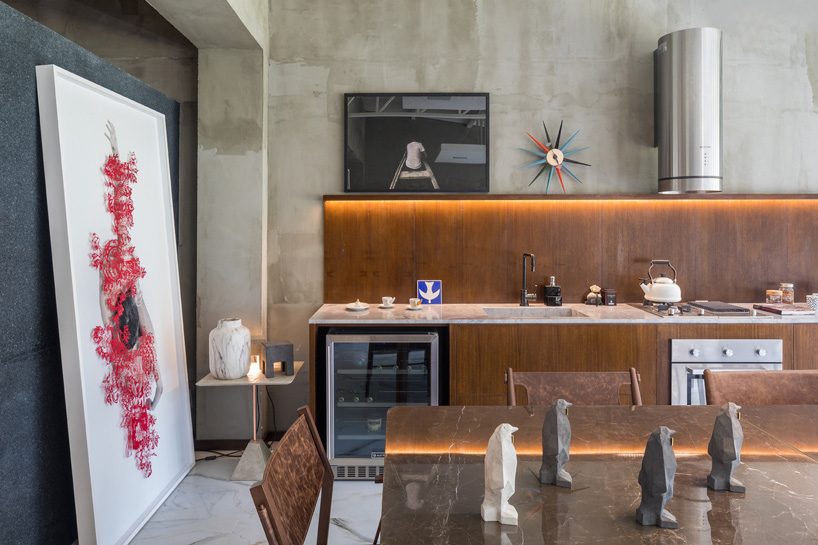 debaixo do bloco transforms part of an oscar niemeyer building into 68 sqm apartment