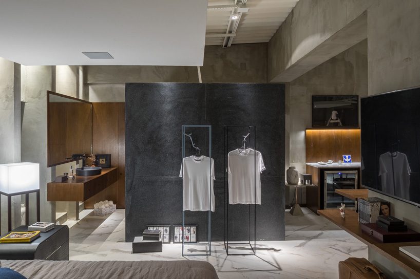 debaixo do bloco transforms part of an oscar niemeyer building into 68 sqm apartment