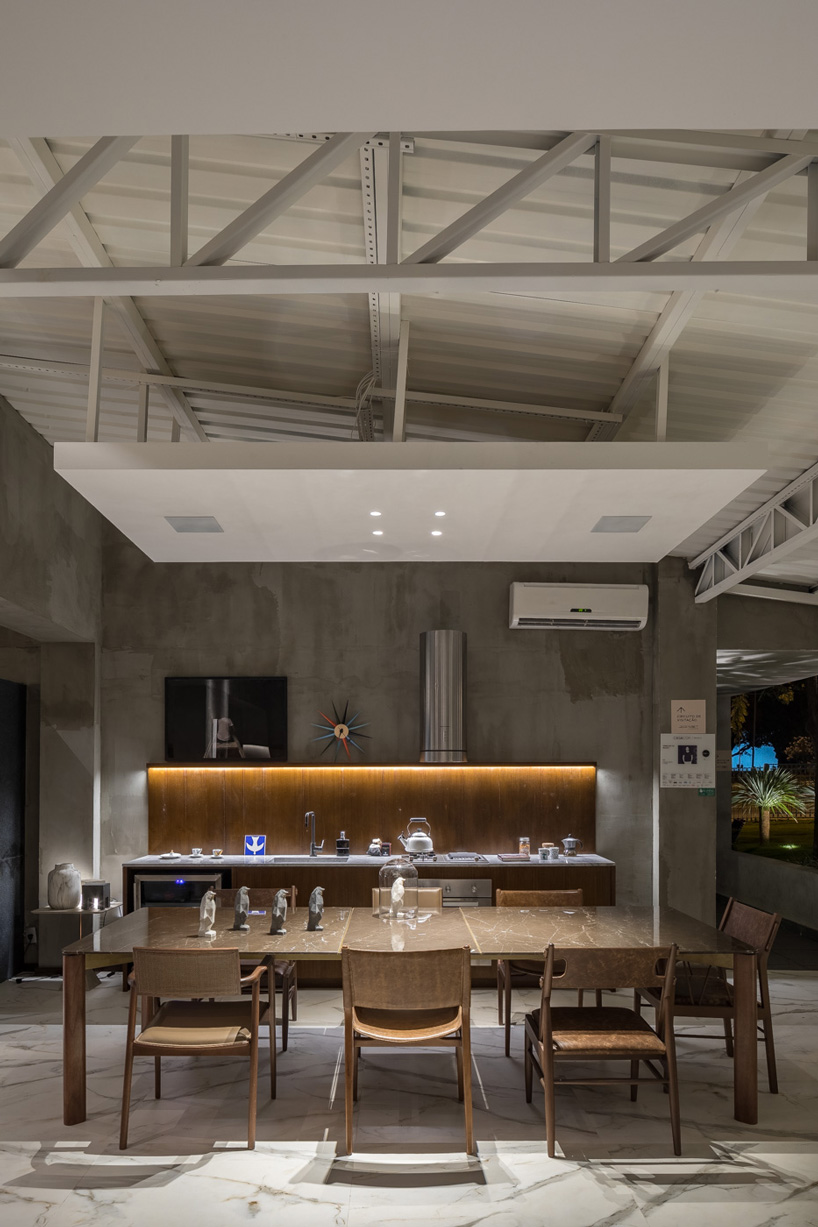 debaixo do bloco transforms part of an oscar niemeyer building into 68 sqm apartment