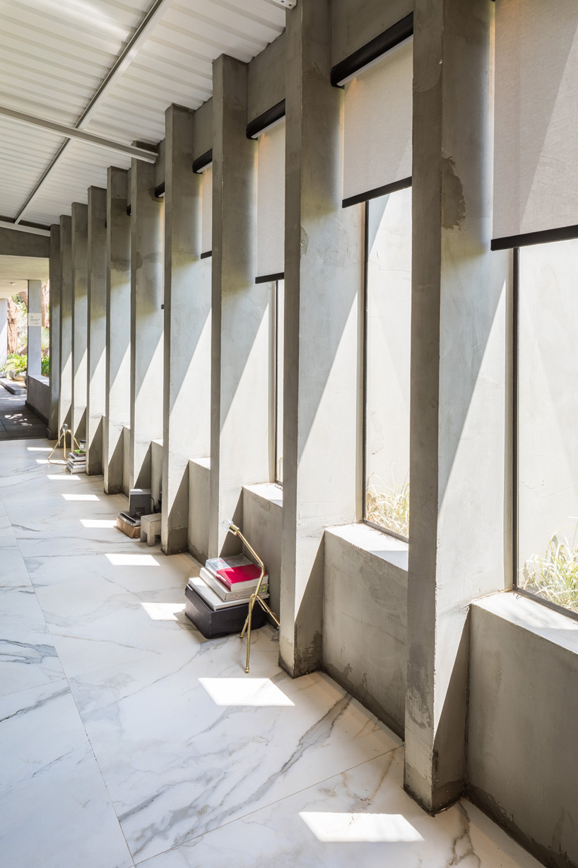 debaixo do bloco transforms part of an oscar niemeyer building into 68 sqm apartment