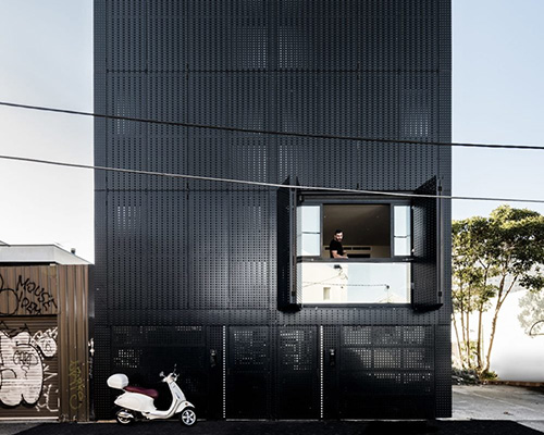 DKO + SLAB add black metal screen façade to vertical dwellings in australia