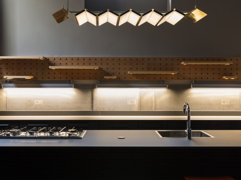 DVDV studio architects completes 'blue and concrete' apartment in milan