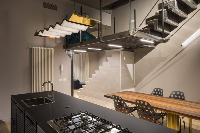 DVDV studio architects completes 'blue and concrete' apartment in milan