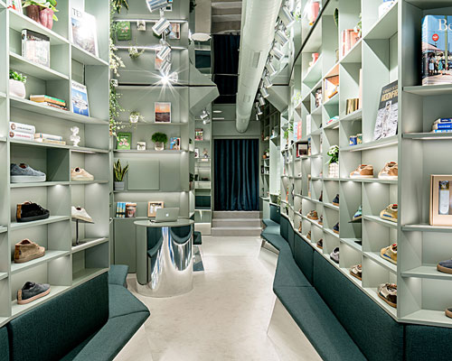 architects display sneakers like books in a madrid showroom
