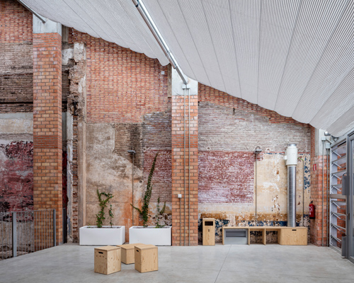 restoration by HARQUITECTES expresses heritage building's structural memory