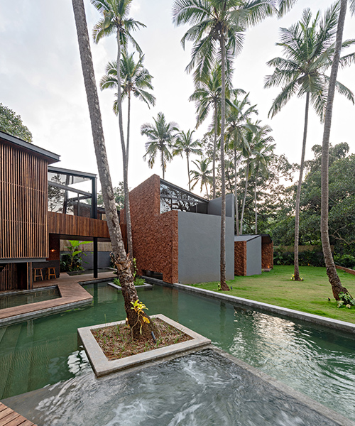 the fragmented 'villa in the palms' integrates native coconut trees of western india