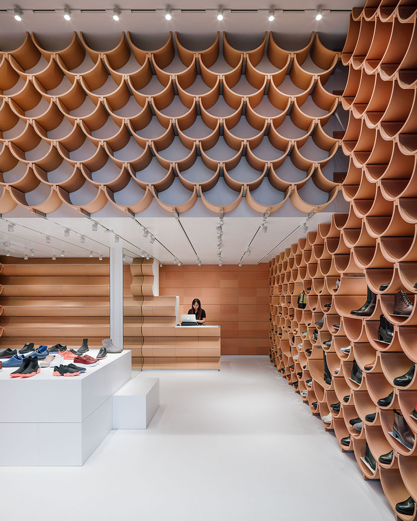 kengo kuma renovates camper's barcelona store using vaulted ceramic plates