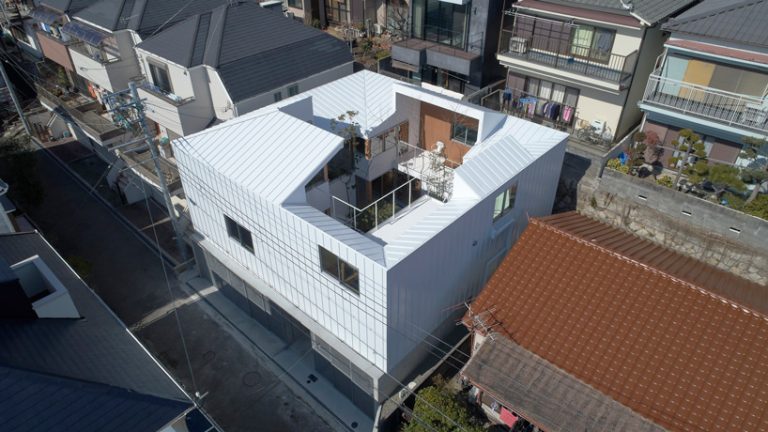 tomohiro hata blurs the boundaries of the loop terrace house in japan