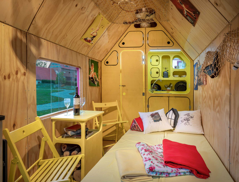 the magenta tiny  house  is a kitsch interpretation of 