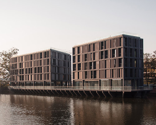 major architekci constructs 'marina III' residential complex on small island in wrocław