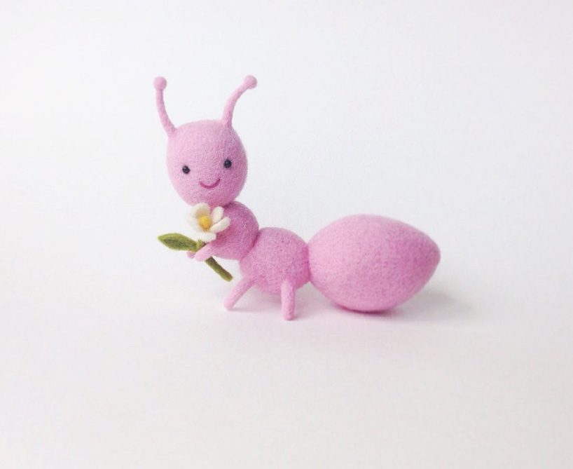 manooni's food and animal families are handcrafted using needle felted wool