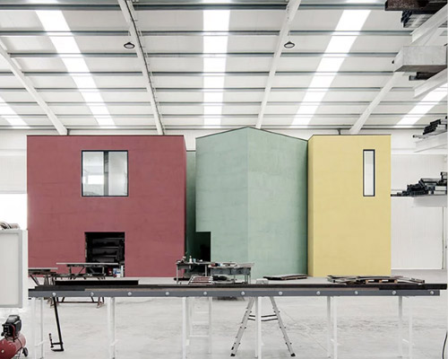 martins architecture office constructs large reflective warehouse in portugal