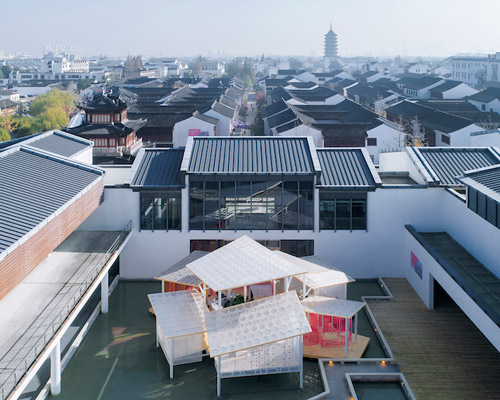 MAT office creates a canopy of roofs for the 2018 suzhou design week pavilion 