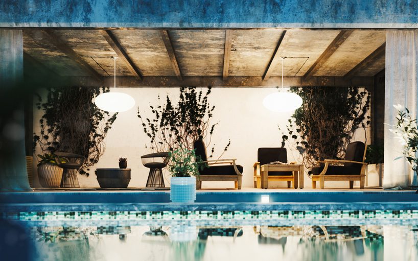 floor-to-ceiling gridded windows compose the façade of this residential complex in cyprus