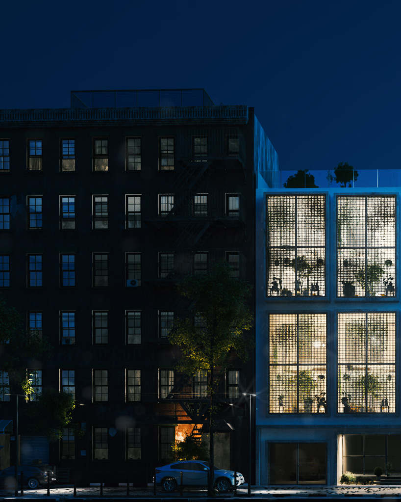 floor-to-ceiling gridded windows compose the façade of this residential complex in cyprus
