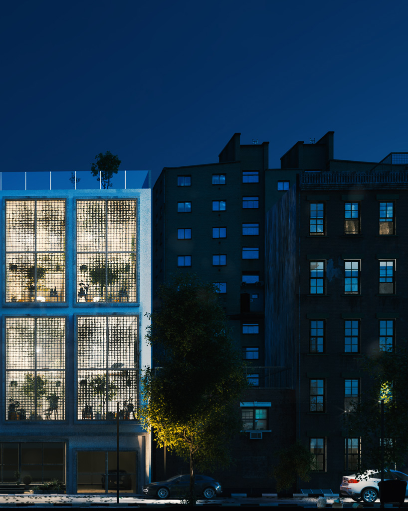 floor-to-ceiling gridded windows compose the façade of this residential complex in cyprus