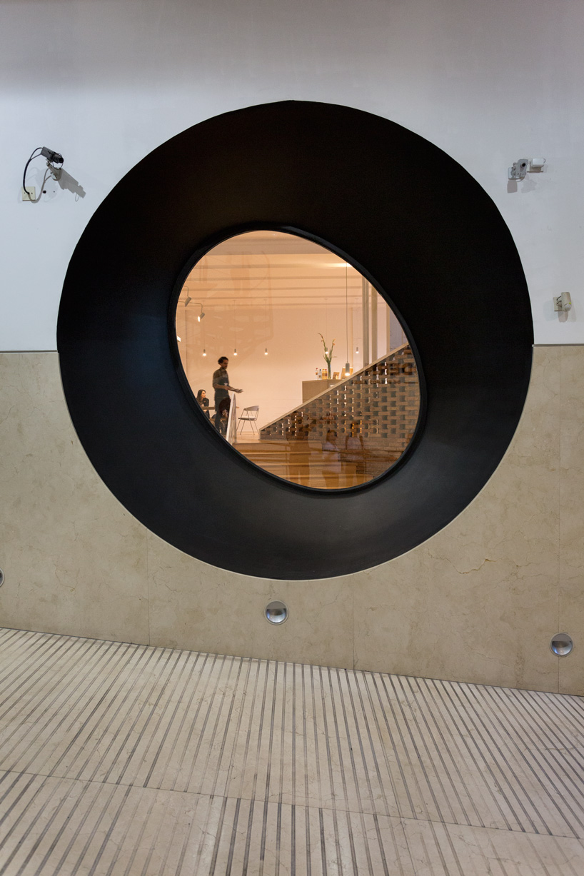  sculptural staircase connects the MSGSSS-renovated museum of modern art in buenos aires