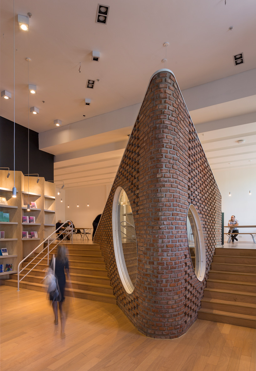  sculptural staircase connects the MSGSSS-renovated museum of modern art in buenos aires