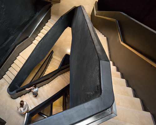 sculptural staircase connects the MSGSSS-renovated museum of modern art in buenos aires