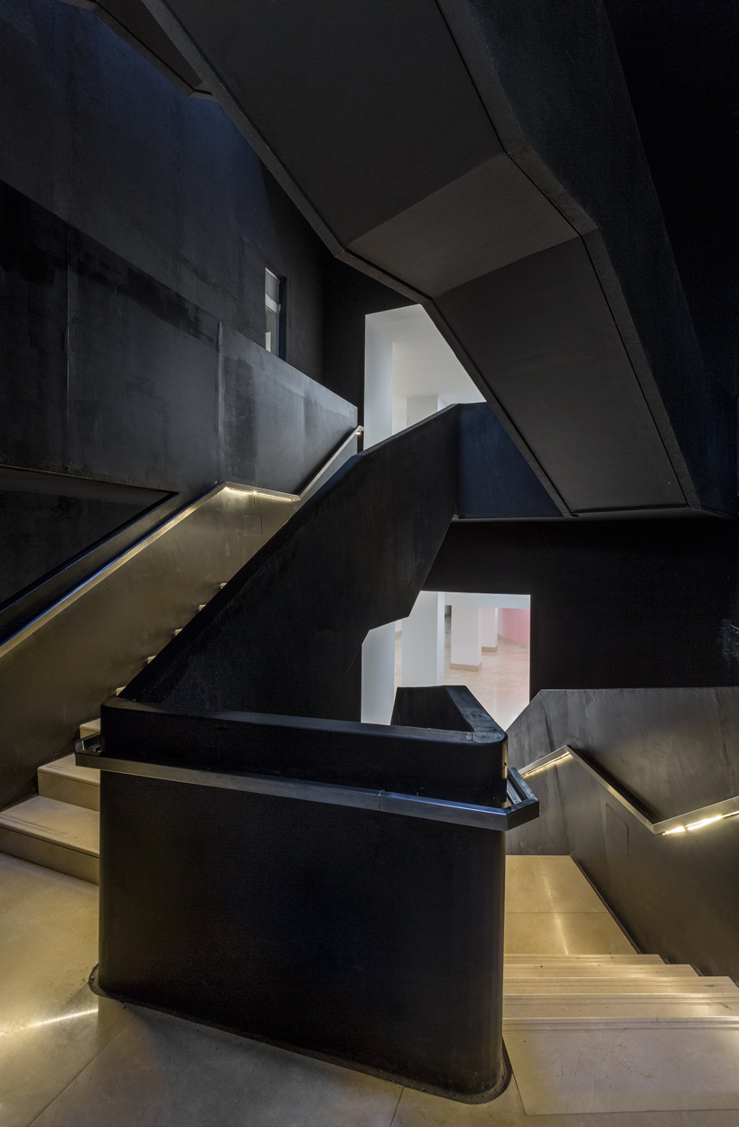  sculptural staircase connects the MSGSSS-renovated museum of modern art in buenos aires