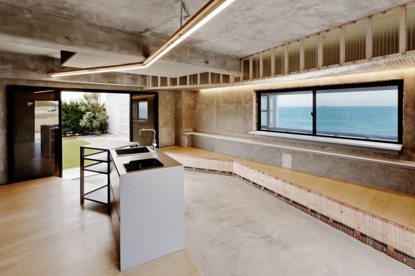 nanometer architecture wraps japanese seaside villa in corrugated polycarbonate panels