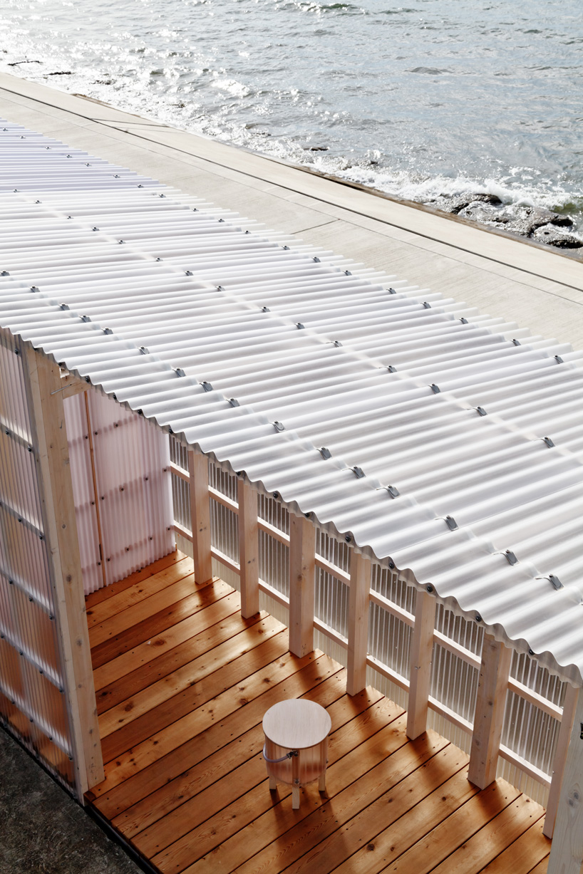 nanometer architecture wraps japanese seaside villa in corrugated polycarbonate panels