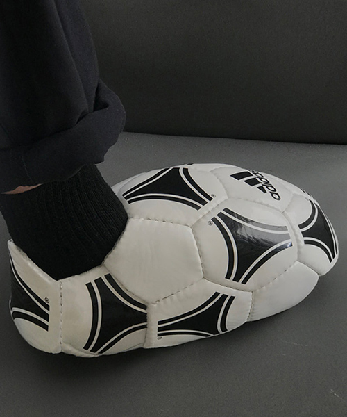 designer dons self-made shuttlecock shoes, soccer ball sliders, and more