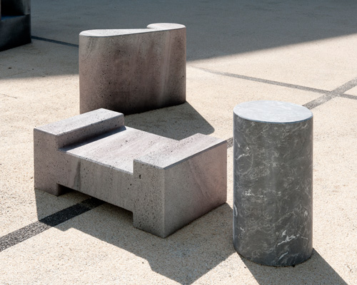 olivier vadrot's lava stone and marble seats are shaped like latin alphabet letters